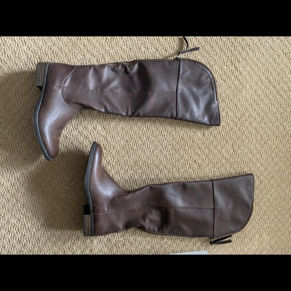 Brown knee high boots with zipper on the back